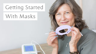 Woman holding microcurrent mask to face with Getting Started With Masks title on image