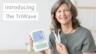 Woman holiding MyoLift TriWave device with Introducing The TriWave title on image