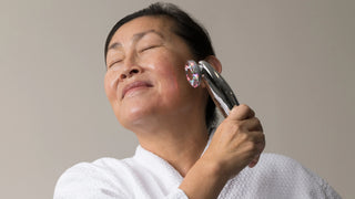 woman with glowing skin using the Time Master Pro