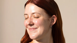 woman wearing Face Reality Soothing Clay Mask