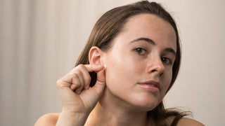 model using a Face Reality Invisiclear Pimple Patch