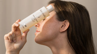 Woman holding Face Reality Moisture Balance Toner
