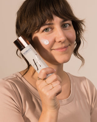 Mahalia LeClerc applying Hydrinity Hydri-C Daily Vitamin C Moistuizer for luminous skin.