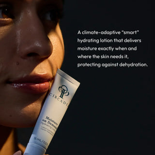 Woman holding Circadia Moisture on Demand Hydrating Lotion tube, a climate-adaptive smart hydrating lotion that delivers targeted moisture exactly where the skin needs it to protect against dehydration