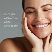 Smiling woman with glowing skin holding her face, showing Circadia Phito-Pep 1.6 Antioxidant Lotion is best for all skin types, aging, and stressed skin