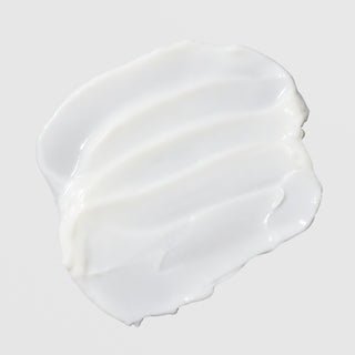 Close-up texture swatch of Colorescience Barrier Pro Essential Moisturizer showing rich white cream formula