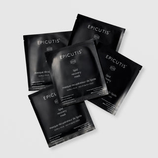 Five Epicutis Lipid Recovery Mask single-use black foil packets fanned out on a light gray background