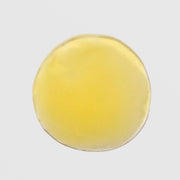 Skin Script Vitamin C Green Tea Serum texture swatch showing smooth golden yellow gel with lightweight fluid consistency. Available at Art of Skin Care