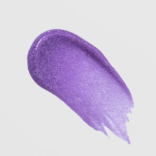 Sparkly purple gel texture swatch of ALASTIN ReSURFACE Skin Polish exfoliant