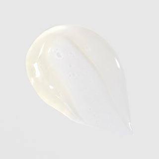 Lightweight cream texture swatch of ALASTIN Regenerating Skin Nectar on light background