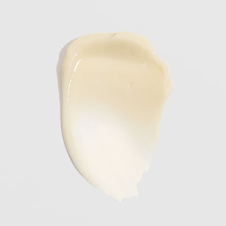 Smooth cream texture swatch of ALASTIN Restorative Neck Complex on light background