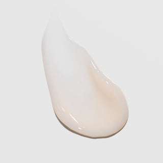 Rich cream texture swatch of ALASTIN Restorative Skin Complex on light background
