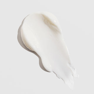 Thick cream texture swatch of ALASTIN Ultra Nourishing Moisturizer on light background