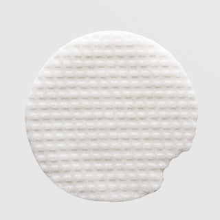 BiON Mandelic 5% Toner Pads – close-up of textured white cotton pad for exfoliating brightening and acne-prone skin toning