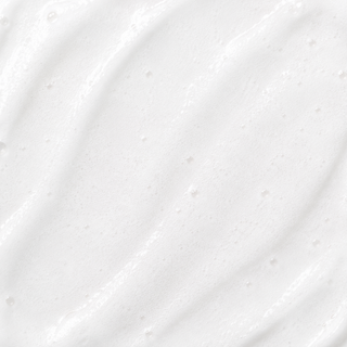 Close-up texture swatch of CO2Lift Carboxy Mousse Moisturizer showing lightweight airy white foam consistency