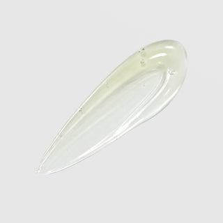 Circadia Lip Renewing Hydrator Naked texture swatch – sheer pale green gel with lightweight watery consistency