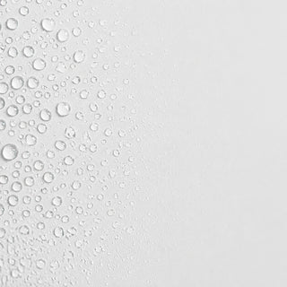 Close-up of Circadia Aloe & Calendula Calming Mist showing fine water droplets, representing its lightweight cooling mist texture