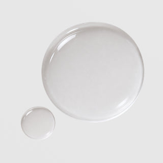 Circadia Eye Lift Serum texture swatch showing clear lightweight gel drops with a glossy, water-like consistency