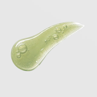 Circadia Lip Renewing Hydrator Peppermint Mocha – olive-green gel swatch showing thick nourishing consistency with botanicals