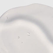 Circadia Serum 71 Renewal Serum close-up texture swatch showing lightweight clear gel with a soft silver tone and micro-bubbles