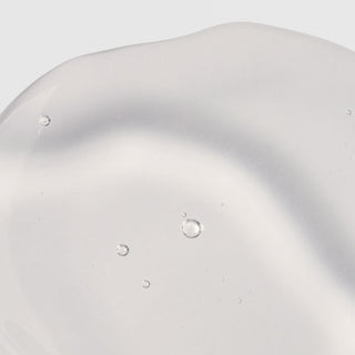 Circadia Serum 71 Renewal Serum close-up texture swatch showing lightweight clear gel with a soft silver tone and micro-bubbles