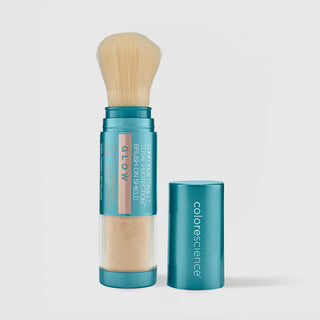 Colorescience Sunforgettable Total Protection Brush-On Shield Glow SPF50 in Deep, teal powder brush with cap removed showing warm bronzed powder and soft natural bristles