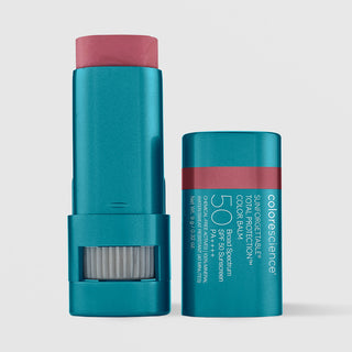 Colorescience Sunforgettable Total Protection Color Balm SPF50 in Berry, teal twist-up stick open with cap beside it showing berry pink shade, 100% mineral water resistant, 9g