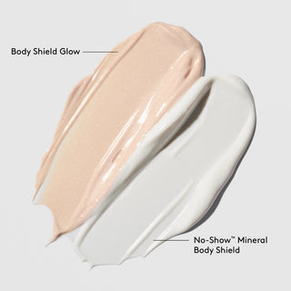 Colorescience Body Shield Glow shimmery peach swatch compared to No-Show Mineral Body Shield white cream swatch on a white background