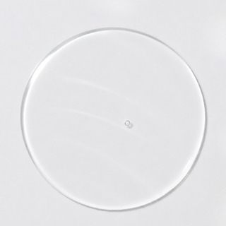 Close-up of Corthe Dermo Essential Cleansing Oil showing a lightweight, clear oil texture on a light gray background