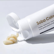 Dermathod Soba Calming Cream white tube tipped with cream dispensed, cooling moisturizing and calming formula for balanced skin on light gray background