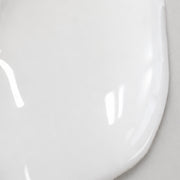 Dr. esthe Rejuvenating PDRN Ampoule texture swatch - glossy translucent white gel formula close-up