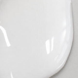 Dr. esthe Rejuvenating PDRN Ampoule texture swatch - glossy translucent white gel formula close-up