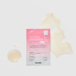 Dr.esthe Anti-Mela Toning Mask pink foil packet shown with unfolded sheet mask and serum essence drop, brightening hyperpigmentation treatment with Niacinamide Tranexamic Acid and Glutathione
