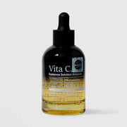 Dr.esthé Vita-C Radiance Solution Ampoule 50ml amber glass dropper bottle with 71% lemon water, 10% vitamin complex, Alpha-Melight formula, and 5000ppm goat milk for advanced brightening
