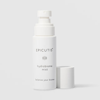 Epicutis Hydrobiome Mist balance your biome facial mist in a minimalist white spray bottle with cap removed, on a light gray background