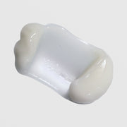 Close-up of Epicutis Lipid Body Treatment showing a rich, glossy white cream texture on a light gray background