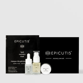 Epicutis Recovery Care Set including Lipid Recovery Mask foil packet, Lipid Serum dropper bottle, Oil Cleanser pump bottle, and Hyvia Crème jar displayed in front of a black gift box on a light gray background
