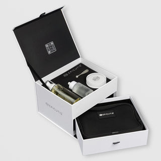 Two-tier Epicutis Skincare Simplified gift box open to show full-size products on top and travel case in drawer