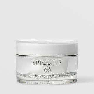 Epicutis Hyvia Crème luxury face cream in a clear glass jar with white lid on a light gray background