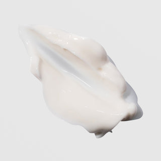 Close-up of Epicutis Hyvia Crème showing a rich, creamy white moisturizer texture on a light gray background