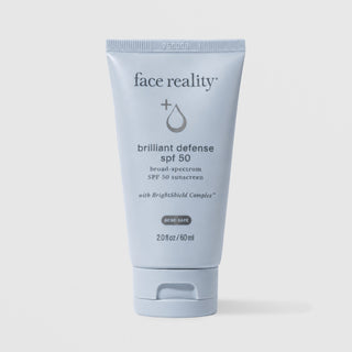 Claude responded: Face Reality Brilliant Defense SPF 50 acne-safe broad spectrum sunscreen 60ml in light blue squeeze tube with BrightShield Complex