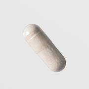 Face Reality Clear Skin Restore capsule close-up – clear capsule with zinc and probiotic powder for acne-prone skin