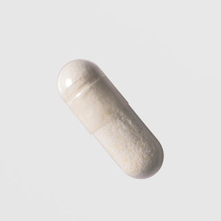 Face Reality Clear Skin Restore capsule close-up – clear capsule with zinc and probiotic powder for acne-prone skin