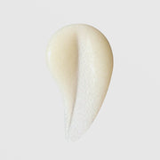 Face Reality L-Mandelic Face and Body Scrub texture swatch – creamy exfoliating formula with visible scrub particles
