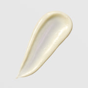 Face Reality Retinol Peptide Serum texture swatch – smooth creamy ivory formula on light gray background