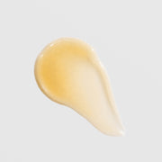 Face Reality glowTone Corrective Serum texture swatch – lightweight golden gel with shimmering finish on white background
