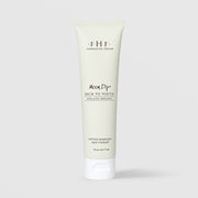 Farmhouse Fresh Moon Dip Back to Youth Ageless Mousse travel tube (2 fl oz / 71 ml) in a soft sage green squeeze tube with a white cap, labeled as a peptide-enriched skin therapy, displayed against a light gray background.