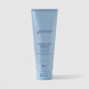 GlyMed Plus Chocolate Masque with Enzymes in light blue squeeze tube, 2.0 oz, on light gray background