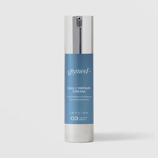 GlyMed Plus Daily Repair Cream in white pump bottle with silver pump and blue label, 1.69 oz, on light gray background