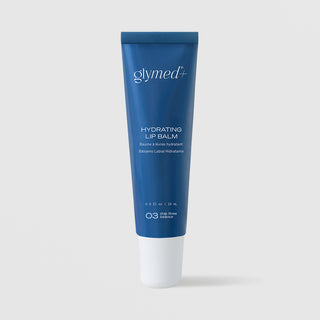 GlyMed Plus Hydrating Lip Balm in navy blue squeeze tube with white cap, 0.5 oz, on light gray background